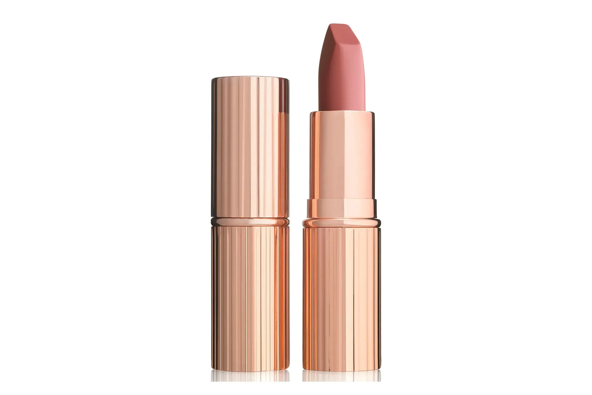 A Charlotte Tilbury Pillow Talk lipstick, with the tube on the left and the opened lipstick showing its pink shade on the right.