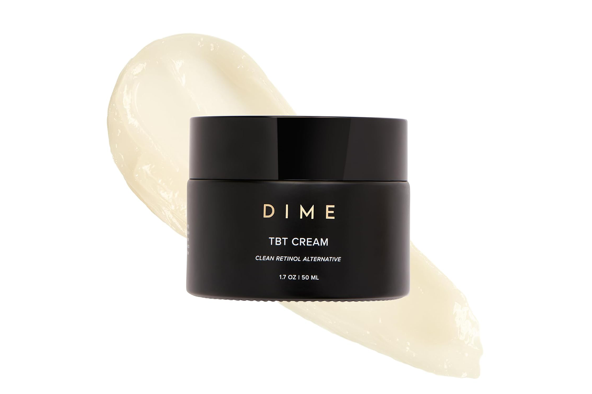 Dime TBT cream with a smear of cream in the background.