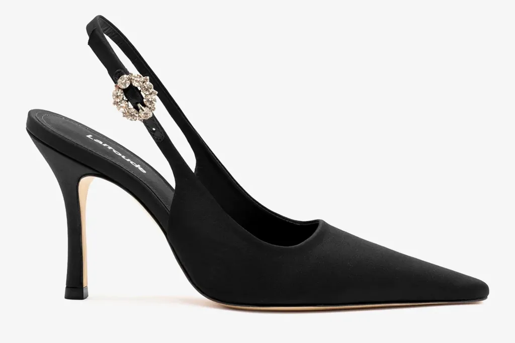Black Larroude slingback heel with a pointed toe and rhinestone buckle.