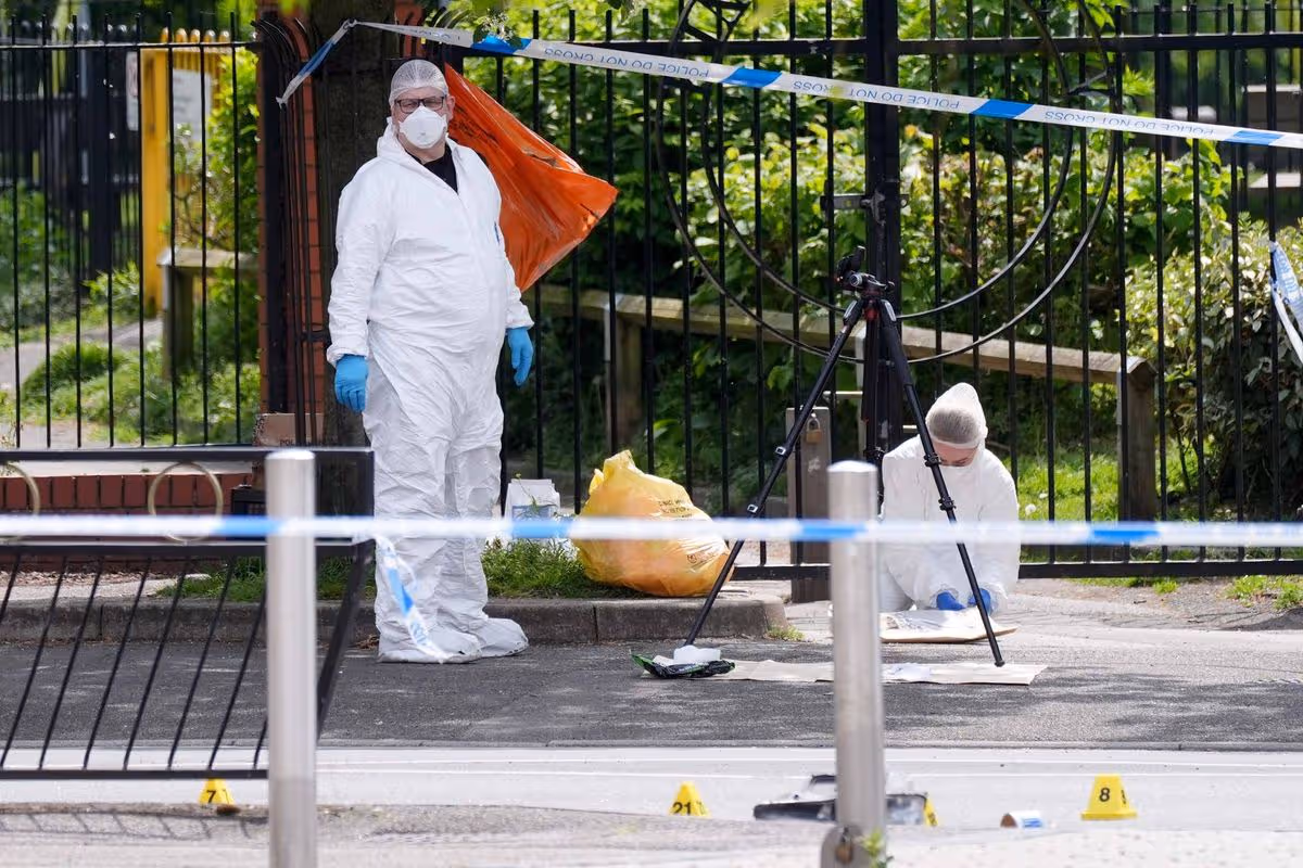 Forensics officers at the scene in Market Place, Arnold, where a man has suffered life-threatening injuries after a car hit multiple pedestrians in the town centre