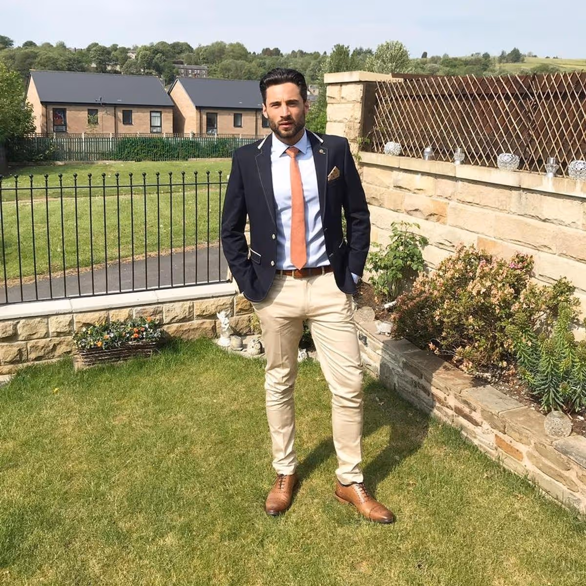 Luke standing in a garden