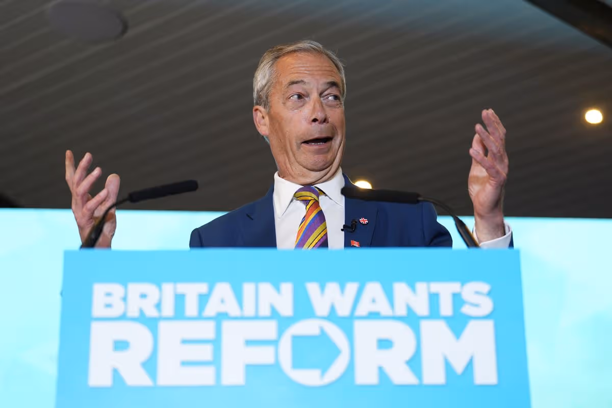 Man stands at podium