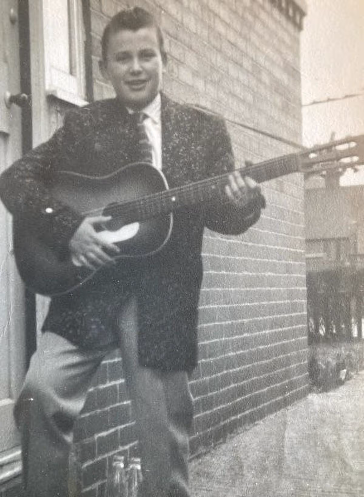 Kurt playing a guitar