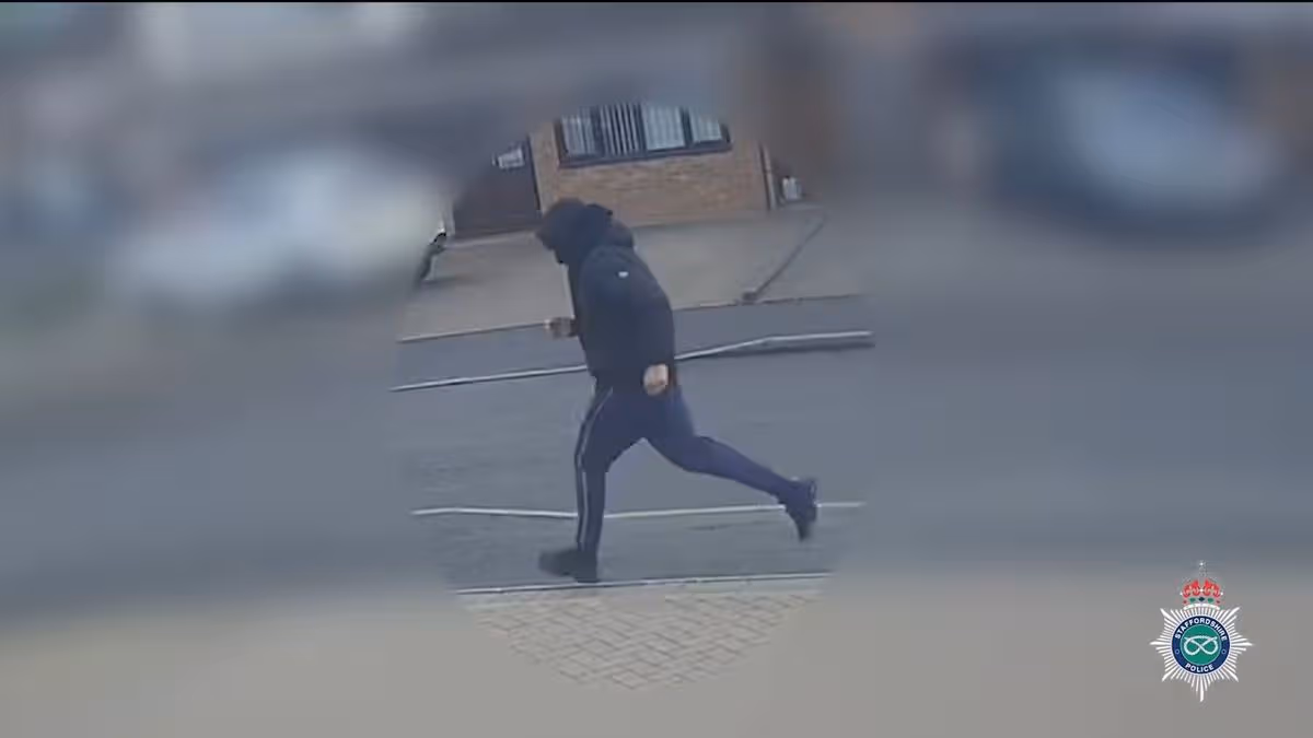 The man believed to be the suspect is seen running from the scene