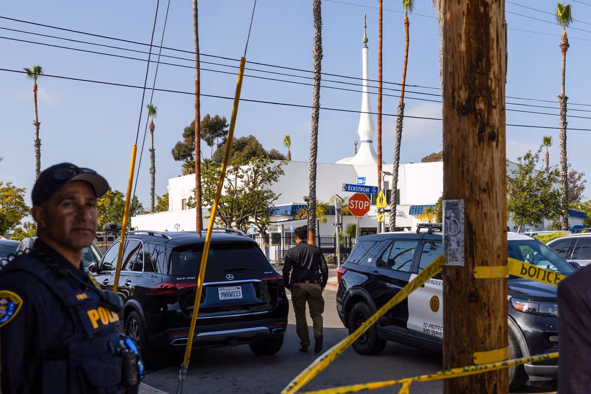 Police officers block access to the Islamic Center of San Diego