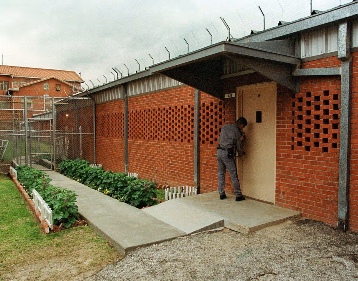 A guard locks the door to the "death chamber" at the Huntsville Unit in Huntsville, Texas