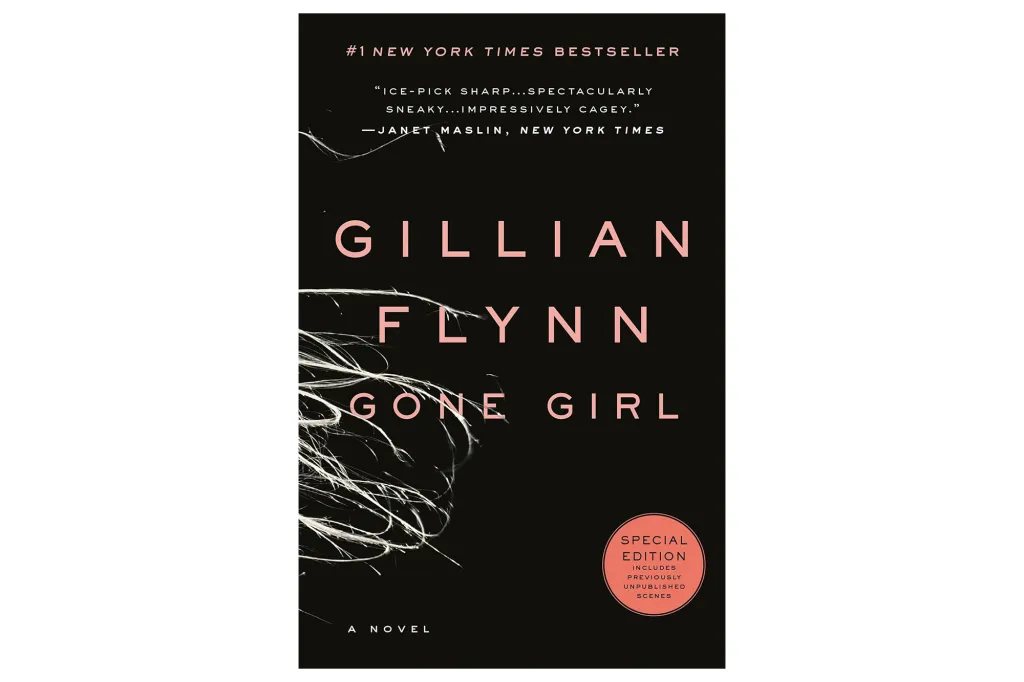 The book cover for "Gone Girl" by Gillian Flynn, with white, wispy lines obscuring part of the title and a pink circle indicating a special edition.