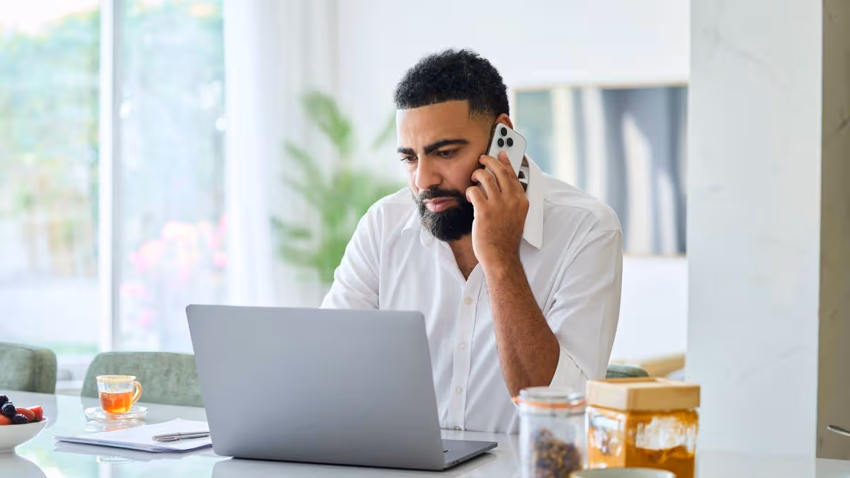 1778490429_0_Emirati-man-talking-on-smart-phone-and-using-laptop.jpg