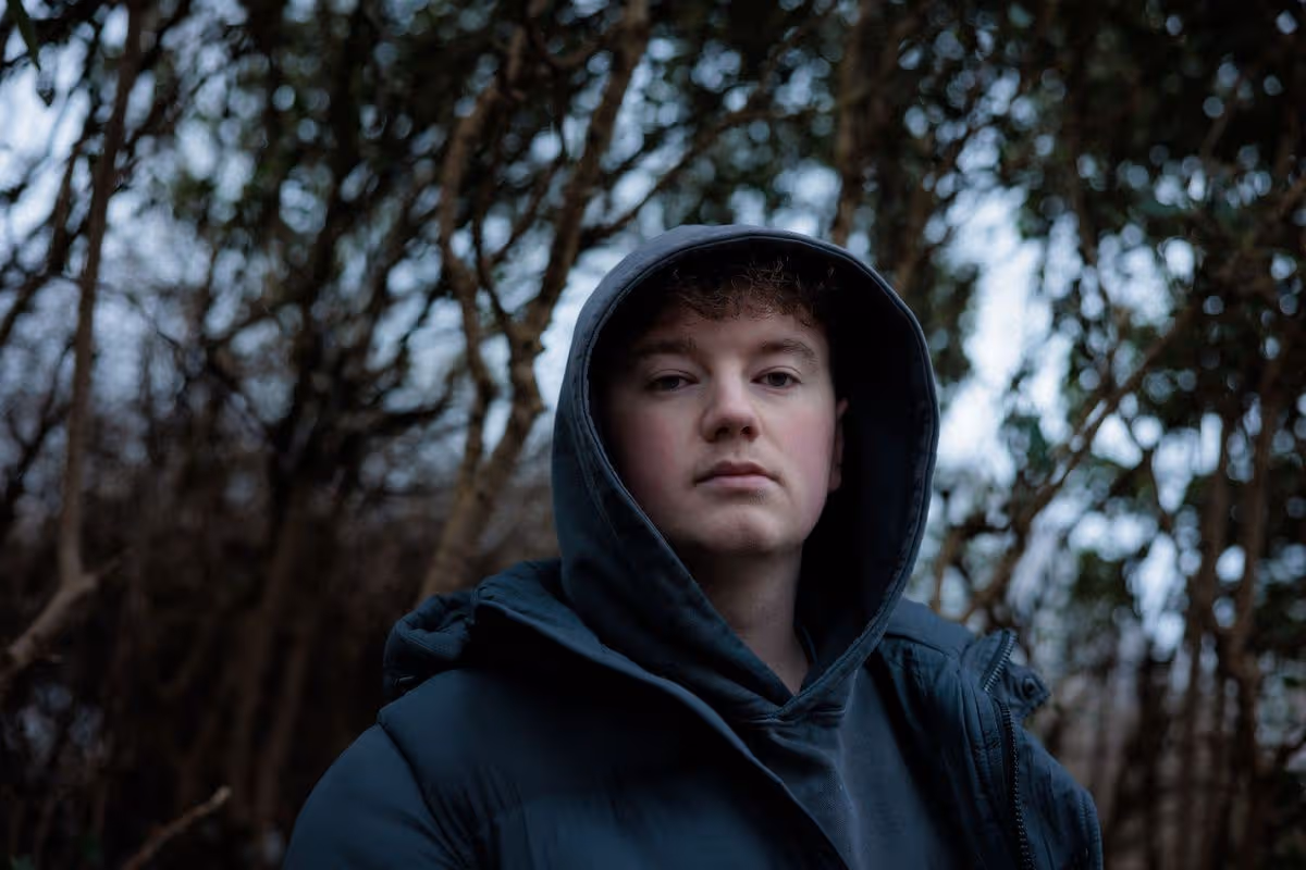 Alex Batty wearing a hooded top