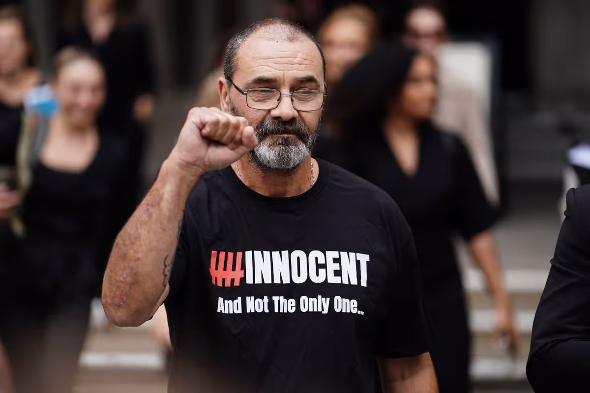Mr Malkinson wearing a T-shirt reading 'Innocent'