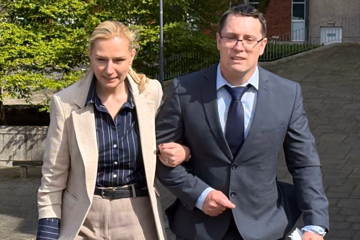 Christopher Trybus (centre) and his wife Bea (left) 