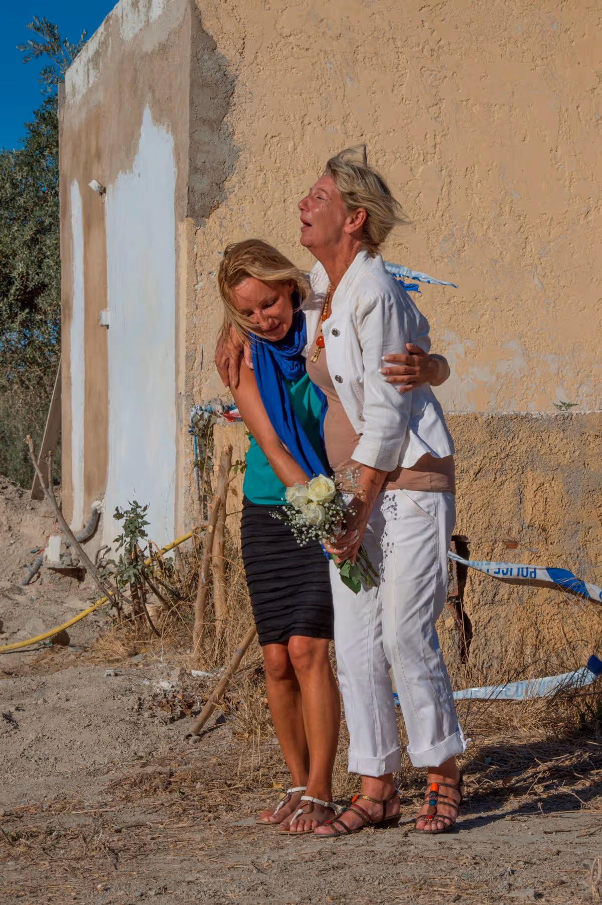 Kerry and Christine Needham crying