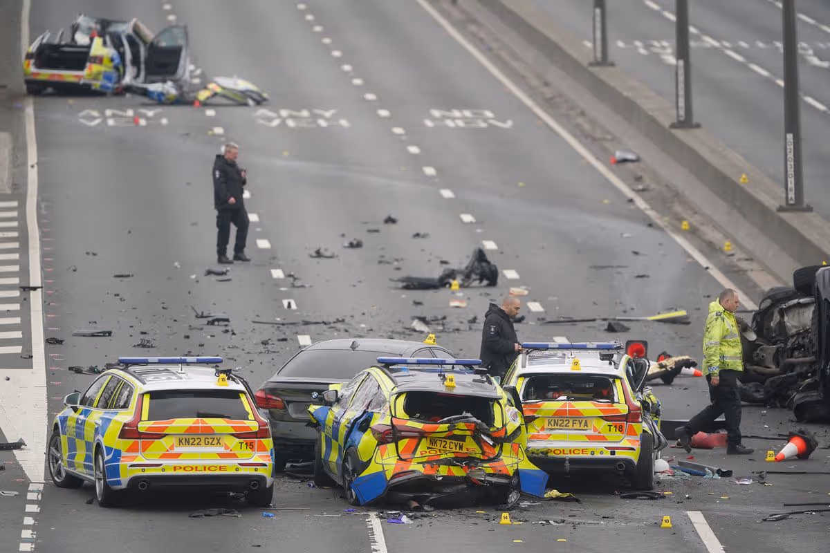 Wrecked police cars on A1 in the aftermath of the crash caused by Mazyar Azarbonyad