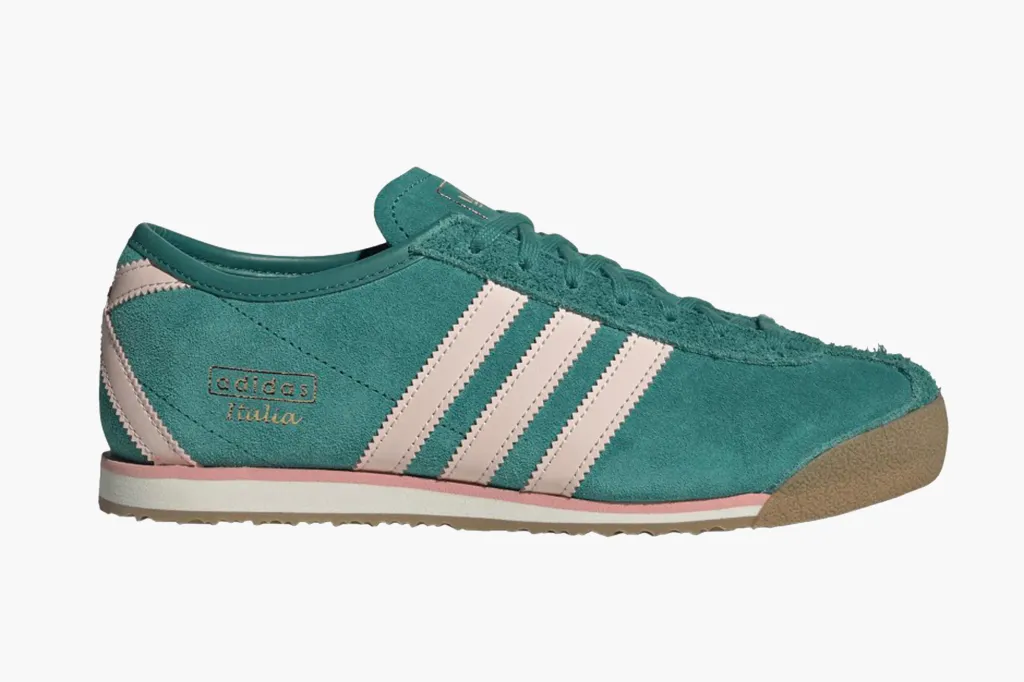 An Adidas Italia shoe in teal suede with pink stripes and "Adidas Italia" in gold lettering on the side.