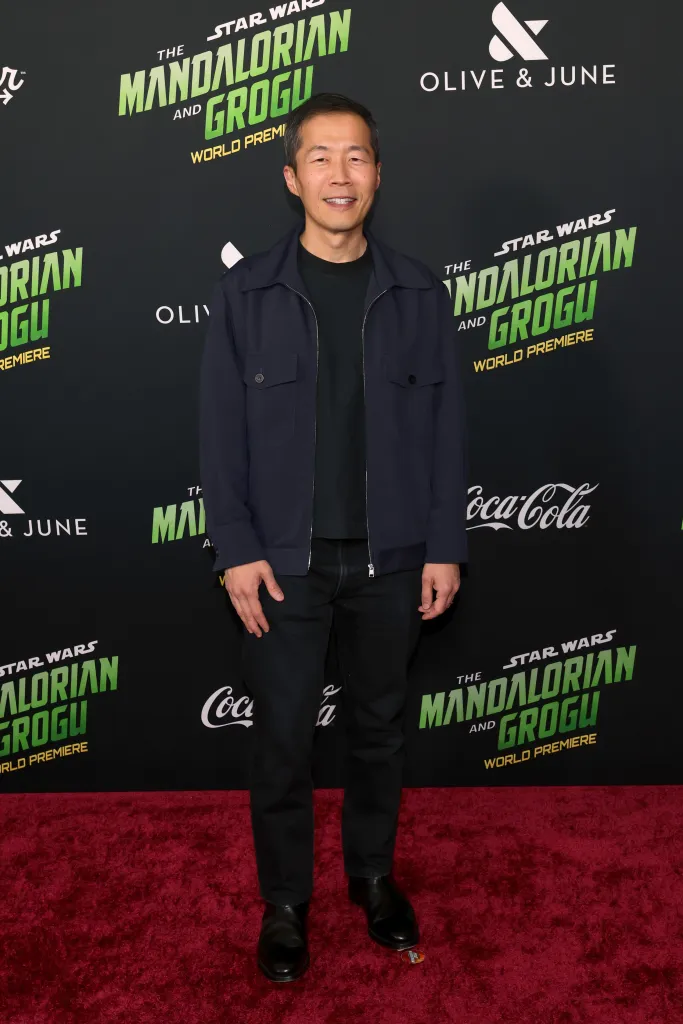Lee Isaac Chung attends the premiere of "The Mandalorian and Grogu"