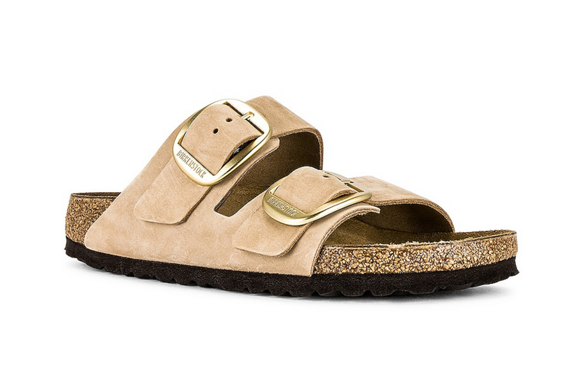 A single tan Birkenstock Arizona sandal with gold buckles and a cork sole.