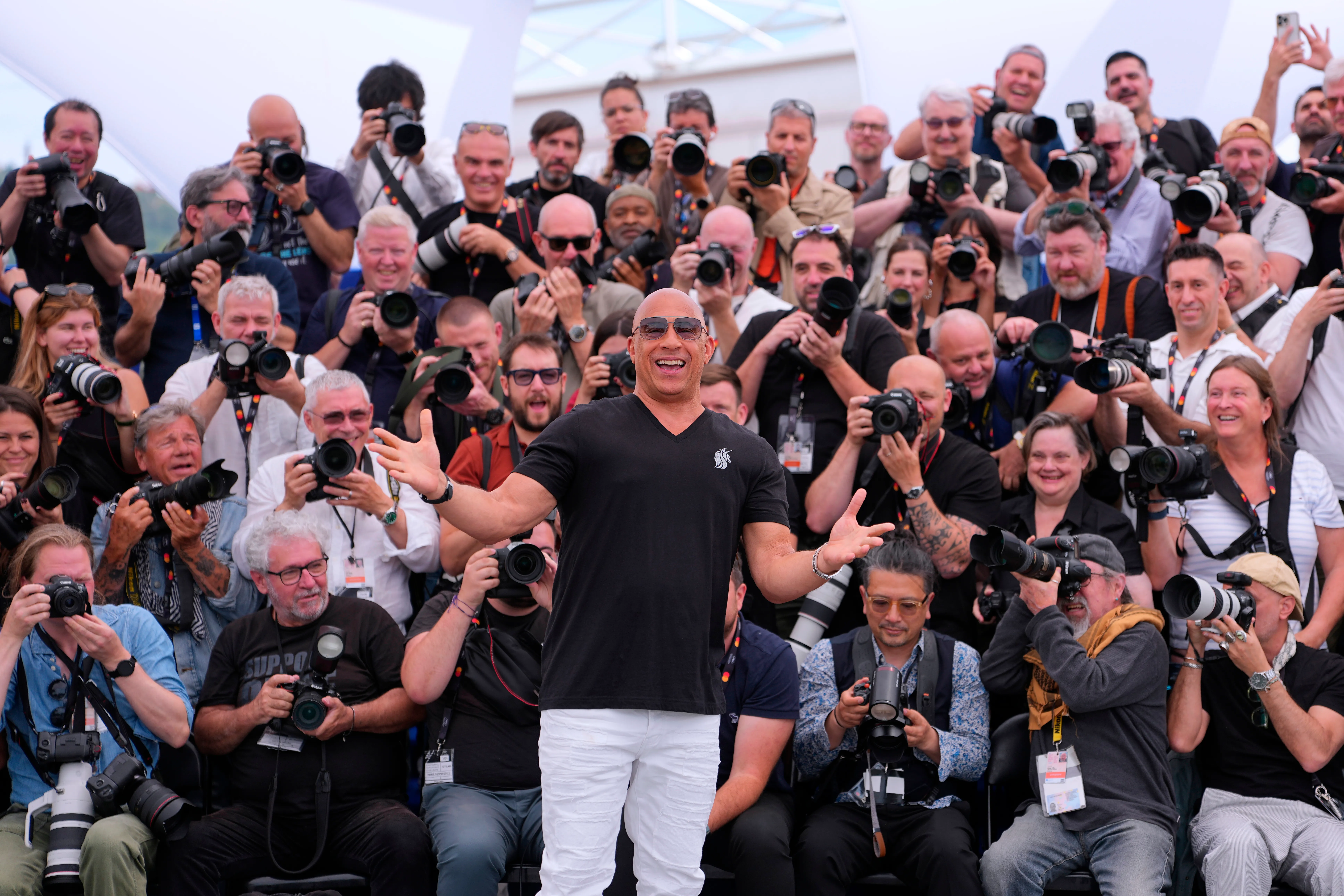 Vin Diesel poses with photographers