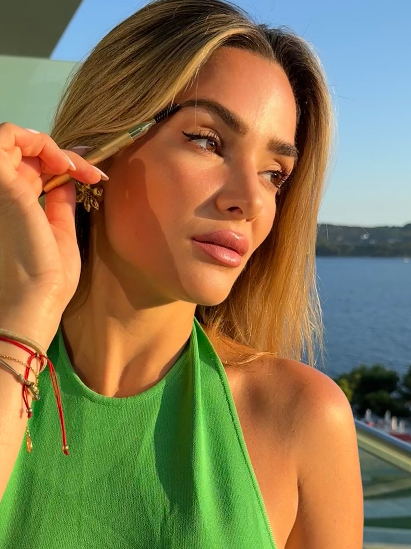 Suzy uses a brow pencil in a lighter shade.
