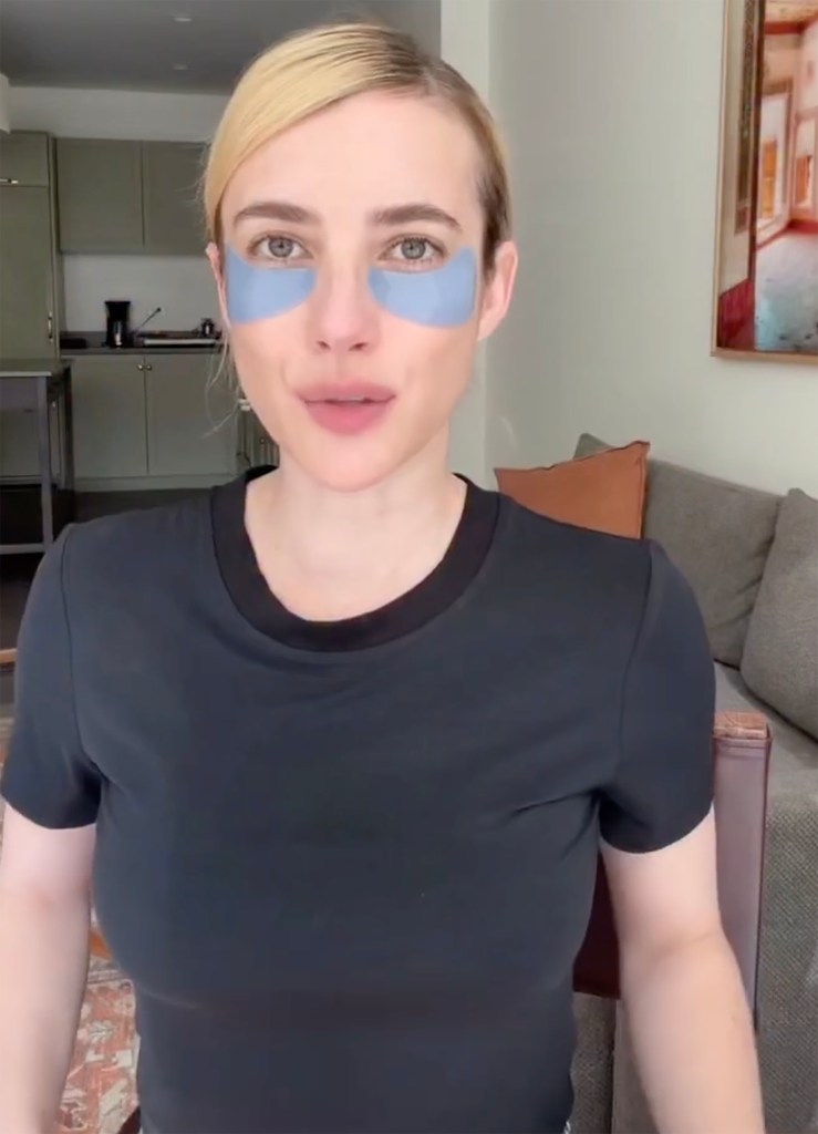 Emma Roberts with light blue eye patches under her eyes.