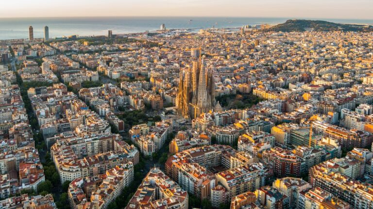 1773973182_0_Sagrada-Familia-and-Barcelona-skyline-at-sunrise-aerial-view-Catalonia-Spain.jpg