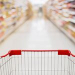 1774660446_0_Shopping-cart-view-in-Supermarket-aisle-with-product-shelves-abstract-blur-defocused-background.jp_.jpeg