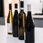 1774671605_0_A-selection-of-wine-bottles-displayed-on-a-sleek-kitchen-counter-showcasing-different-varieties-fo.jpeg