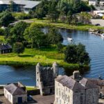 0_Aerial-view-of-Enniskillen-town-with-River-Erne-curving-through-residential-areas-and-green-landsc.jpeg