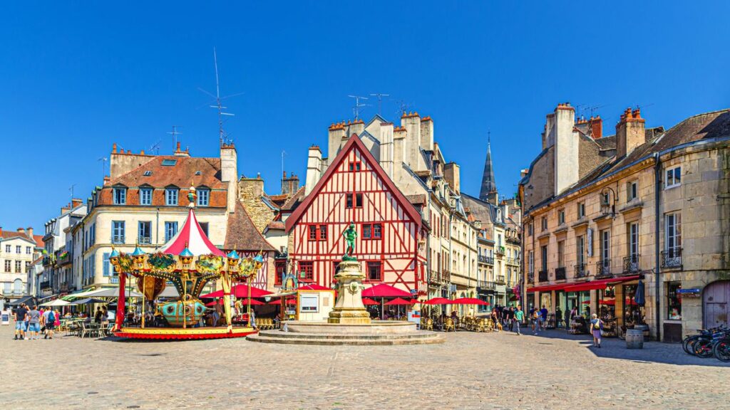 1775352424_0_Dijon-city-historical-centre-with-old-typical-houses-colorful-buildings-and-merry-go-round-carouse.jpeg