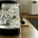 1775998438_0_Modern-electric-transparent-kettle-on-a-wooden-table-in-the-kitchenKettle-for-boiling-water-and-ma.jpeg