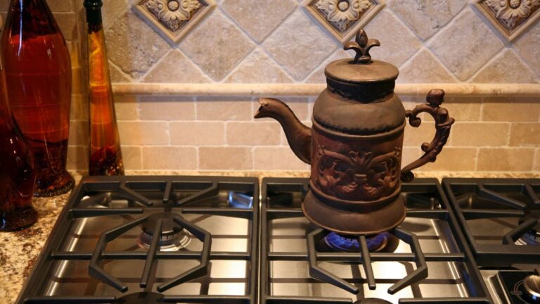 1776306505_0_Tea-Pot-Cooking-with-Natural-Gas-on-Cook-Top-Stove.jpg