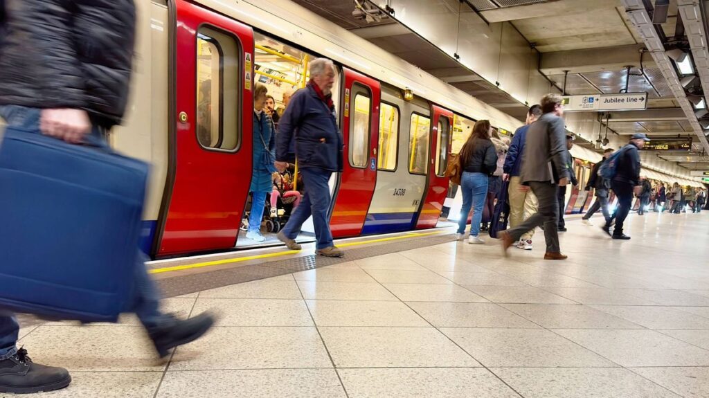 1776925572_0_A-low-angle-view-of-passengers-disembarking-from-a-London-Underground-train-at-Westminster-station.jpeg